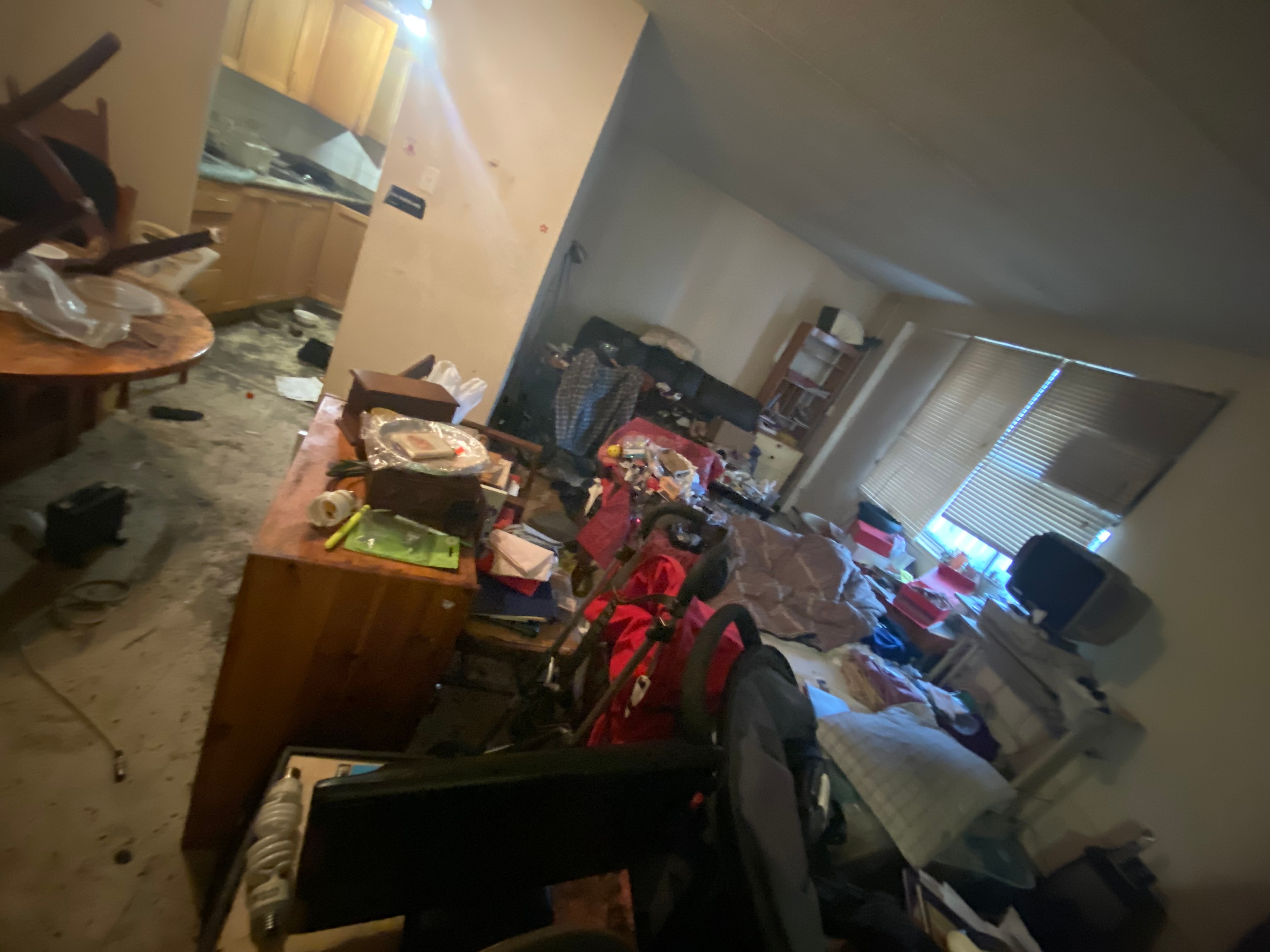 Cluttered residential space with accumulated belongings
